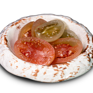 СОЛІННЯ  мариновані помідори-100г.