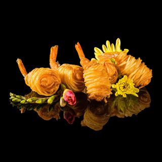 50. Gamberi con laccio di patate