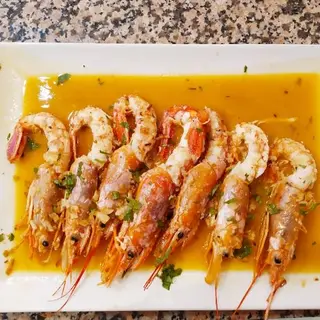 Gambón En Salsa Al Ajillo