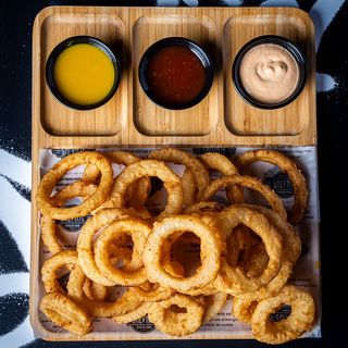 Ración De Aros De Cebolla A La Cerveza Corte Fino (7 Uds.)