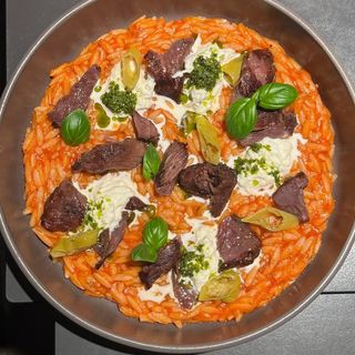 Паста орзо з рваною щокою в соусі Маринара