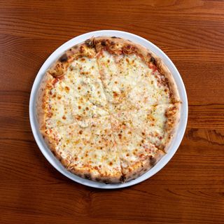 Margherita  sos pomidorowy, ser mozzarella, oregano