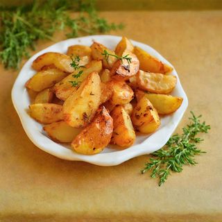 Ćwiartki ziemniaczane opiekane  300 g
