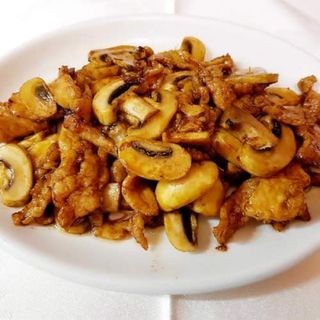 Cerdo Con Champiñones