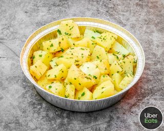 Patatas al ajillo - grande 4,5 Pers. (Imagen ilustrativa no vinculante)