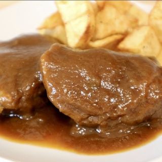 Ración De Carrilleras De Cerdo Guisadas En Vino Tinto