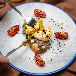 Poached egg with tuna on toast