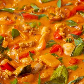 Thai panang chicken curry served with  rice 