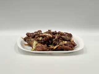 Hrskava svinjetina u sosu od ostriga 400g