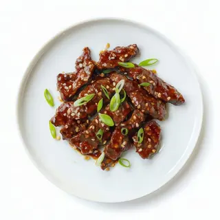 Ternera Frita con Salsa Agridulce y Sésamo