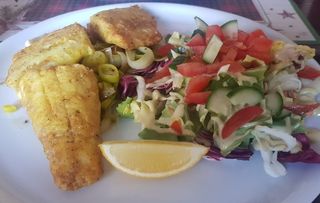 Lucioperca con porri brasati