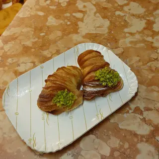 aragostine alla crema con granella di pistacchio