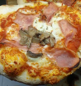 Pizzetta tonda prosciutto e funghi