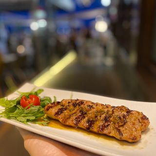 Chorizo criollo a la parrilla con chimichurri