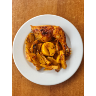 Пилешко бутче с картофи на фурна (500г)