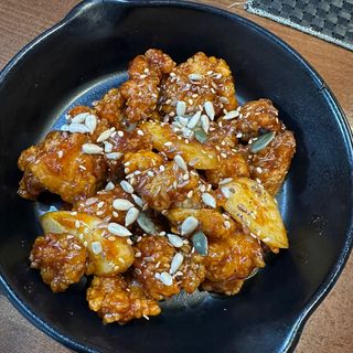 Dak Gangjung con salsa agripicante