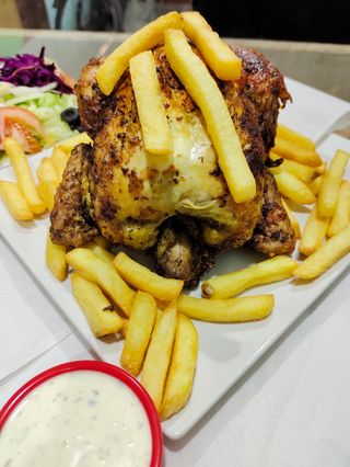 Pollo A L'Ast Entero Con Patatas