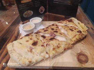 Pizza calzon Fruit De Mer