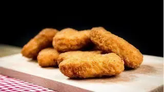 Nuggets de Pollo con Salsa Cheddar