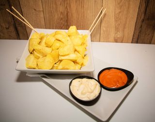 Ración De Patatas Braviolis