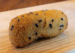 Berenjena escalivada con provolone y miel