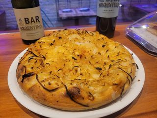 Porcion de Pizza Argentina De Fugazzeta (29 Cm.)