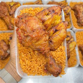 3 spoons Jollof rice + Chicken + Plantain or Coleslaw