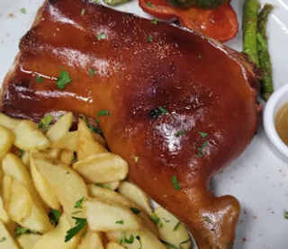 Cochinillo Al Horno En Cuartos