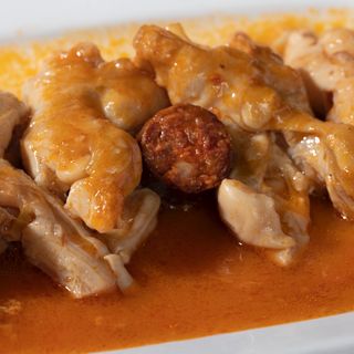 Manitas de cordero estofadas