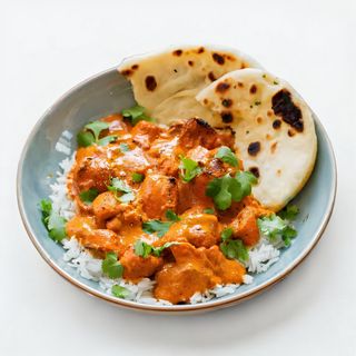 Butter Chicken(Small) +Biryani rice +1 Butter naan + Coca-Cola