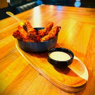 > ALITAS MARINADAS EN BBQ (7 Uds)