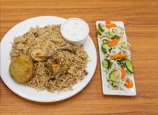 Mutton Pilau with Raita + Shami Kabab + Salad