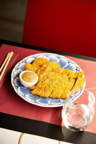 Pechuga de pollo rebozada con sésamo