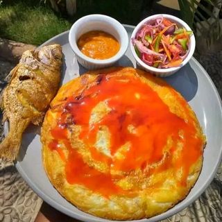 Chips +pan fried eggs