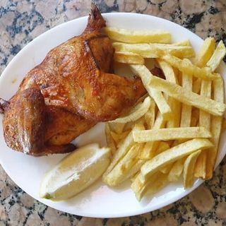 Pollo Al Carbón (1/2 Kg.)