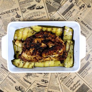Mezzo pollo con porzione di verdure