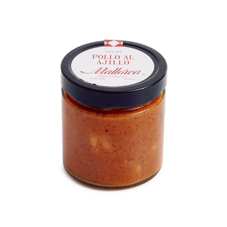 Muslitos de pollo deshuesados en salsa. Frasco 400 g