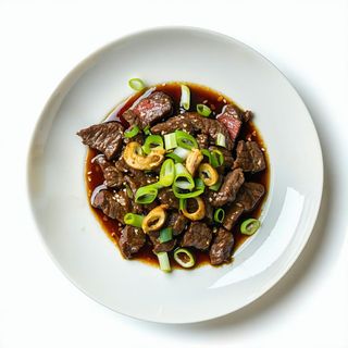 191 Manzo saltato con zenzero e cipollotti