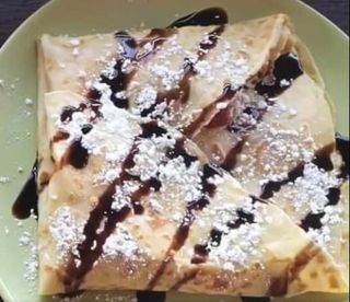 Naleśnik nutella z wiśnią w żelu i cukrem pudrem #7