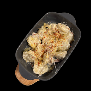 Пельмені запечені з беконом та пармезаном