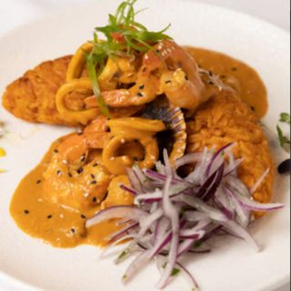 Tacu Tacu en crema de mariscos