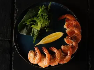 Креветки в часниковому соусі (200g)