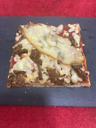 Pizza 8 1/2 (Porción)