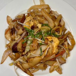 Fideos de arroz fritos con panceta