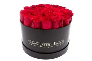 Caja redonda con 15-19 rosas rojas frescas
