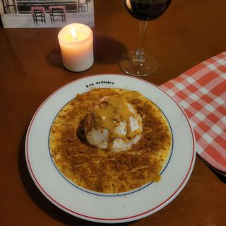 Iie Flottante Aux pralines  et amandes toastées.