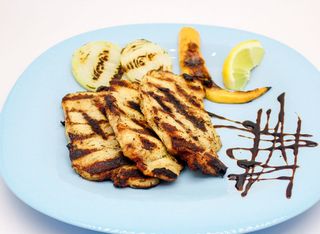 Свински каренца с билкова марината на скара (300г)