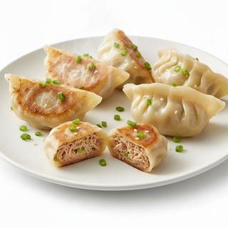 Ravioli con carne di maiale alla piastra