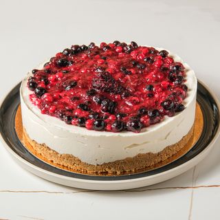 Cheesecake con frutos rojos (8 porciones)