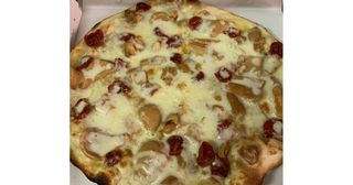 Funghi chiodini, pomodori secchi e crema di mandorle